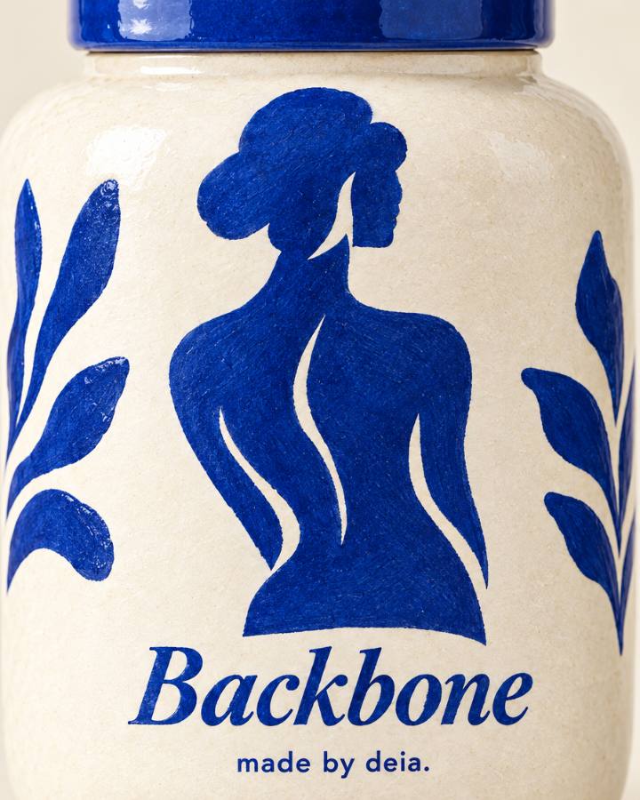 Close-up of the hand-painted cobalt figure on the Backbone jar